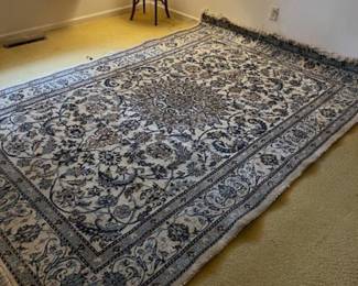 Great are rug, all wool.  Located in bedroom with twin beds