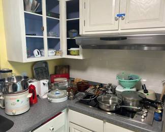 Kitchen goods -- crockpot; bowls; pans, pots, serving ware; more