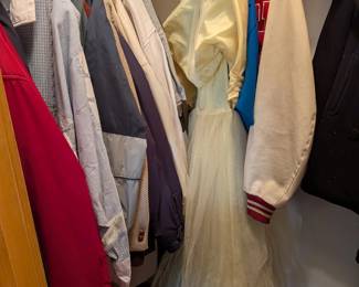 Vintage jackets, dresses, and other clothing.