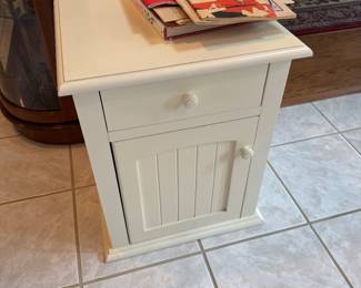 There are 2 of these nice small cabinets