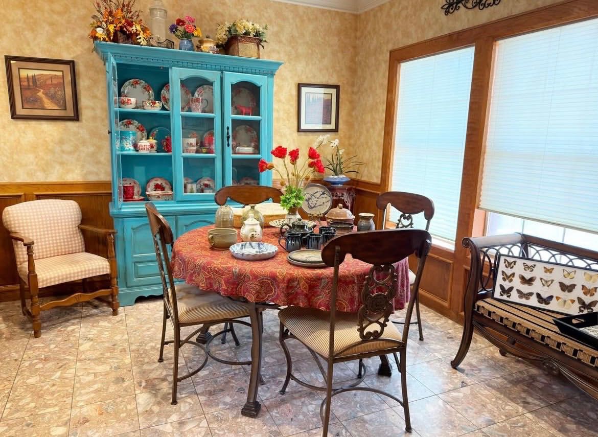 lovely turquoise china cabinet, large colections of Pioneer woman dinnerware and serving pieces