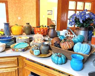 lot's of colorful ceramic pumpkins