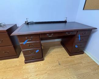 Traditional Dark Wood Executive Desk with Multiple Drawers