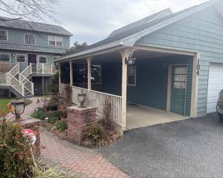 Front of home and garage/workshop