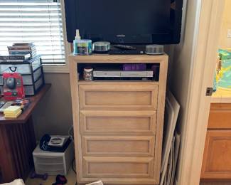 Dresser and lots of tvs 