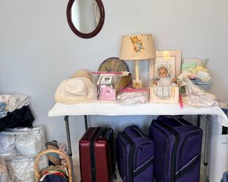 Luggage, vintage baby items 