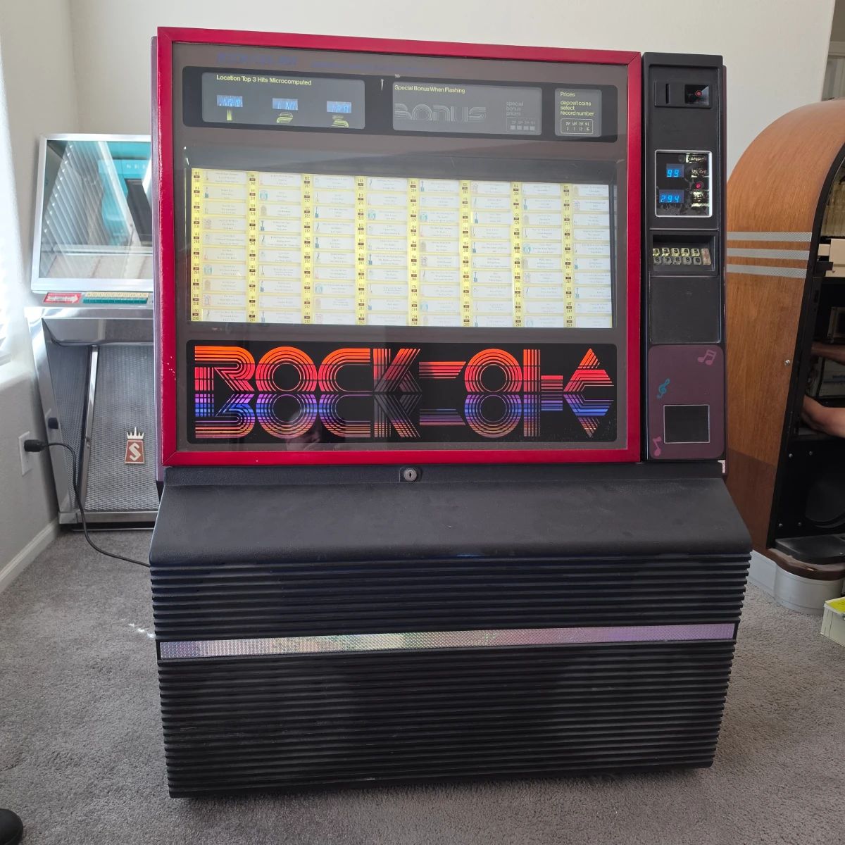 The jukebox is a Rock-Ola Model 484. This model was produced around 1980. We were able to get it to play.