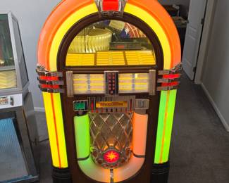 Wurlitzer One More Time 1015 Jukebox. The homeowner said it worked but after they moved it didn't...  It turns on but needs to be serviced.  