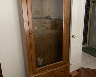 Nice Wood and glass gun cabinet 