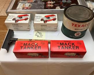 Number One and Number Two Texaco die-cast truck banks sealed in box, full Texaco grease can, etc