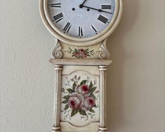 Battery operated clock with hidden key storage