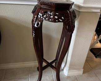 Ornate wooden plant stand 