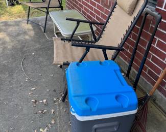 Patio folding chairs, more ice chests