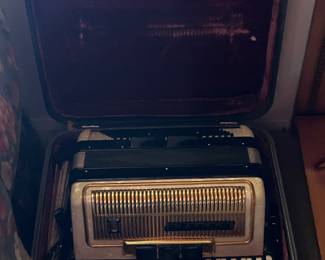 Nice accordian in case and 2 guitars