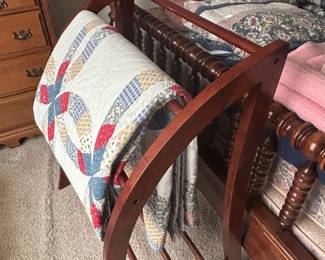 Quilt and quilt rack. 