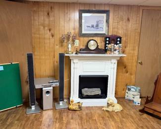 Puzzle Board w/ Drawers; Panasonic DVD Home Theatre Sound System; Electric Fireplace; Wurthemberg Chime Silent Mantle Clock; Beer Steins; Collectible Golf Balls and Holder; Dog & Duck Statues; Twin Air Mattress & Pump; Wooden Childs Rocking Chair