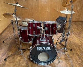 Dreams Drum Set CB-700 (Japan 70’s/ 80’s manufactured by Pearl) 6pc Kit w/ Rogers 14” Snare, (2) 80’s Tama straight cymbal stands, (1) 80’s Tama boom stand, 80’s Tama Hi-Hat Stands (all w/ quick release adjustments), incl. vintage slinger land Hi-Hat (missing seat cup & cymbal net), Slingerland Kick Pedal, Vint. Throne, (Snare 14”, Toms 12”, Toms 13”, Toms (2) 16”, Bass 22”)Cymbals- Meinl (Germany) Headliner Crash 16”, Zildjian 18” China Boy High(is cracked)Full set of Zildjian ZXT Cymbals- 20” Medium Ride, 14” Hi-hat Pair, 18” Crash Ride, 14” Total China, 12” Zillow (made by Zildjian) Heavy Crash, 10” Zildjian A Extra Thin Splash (cracked), 14” Vintage Zildjian Hi-Hats Pair USA, 4 Sets Nylon Tip Drumsticks