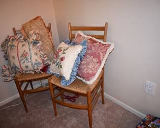 caned chairs, decorative pillows