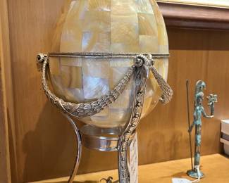 Mother of pearl cover egg in holder