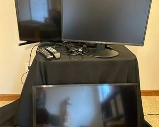 Two Samsung Monitors With One Sceptre Monitor