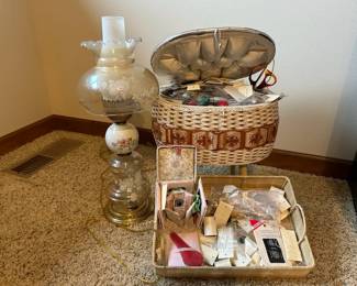 Vintage Lamp With Sewing Supply Basket Filled With Buttons And Thread