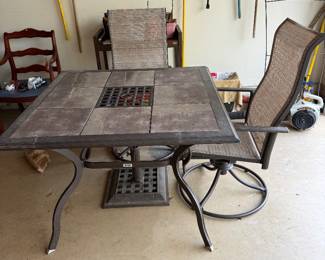 Martha Living slate top and iron patio table and 4 chairs with umbrella (kept inside garage)