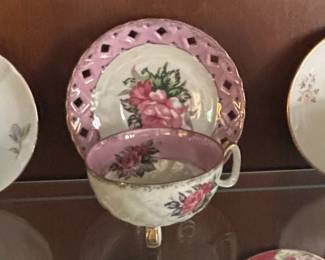Assorted Vintage Porcelain Teacups and Saucers with Floral Motifs