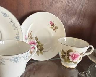 Assorted Vintage Porcelain Teacups and Saucers with Floral Motifs third image