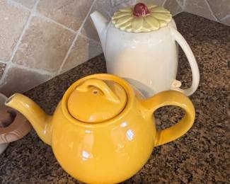 Yellow Ceramic Teapot and White Ceramic Teapot with Flower Lid