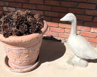 Terracotta Planter with Grapevine Motif and Pinecone Filler, Concrete Goose Statue