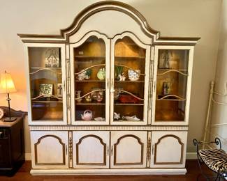 Custom painted and gilt lighted breakfront