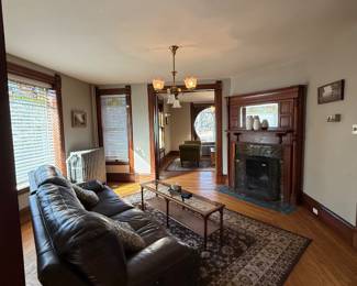 Leather couch and area rugs 