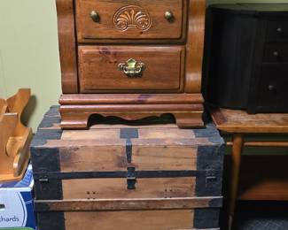 Old wooden truck and vintage nightstand. MCM side table
