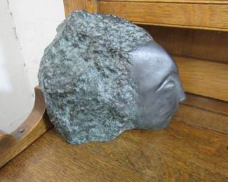 Bronze head marked "B"