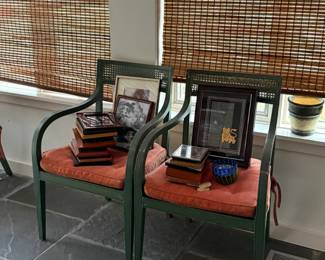 Vintage Metal Garden Chairs with Cushions and Stacked Decor