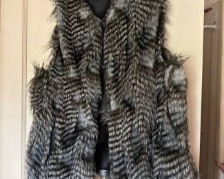 FEATHER VEST