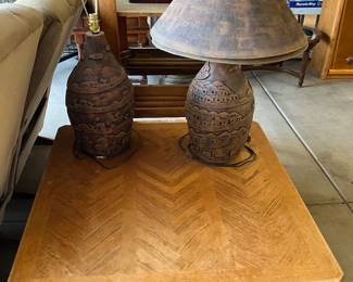 Coffee table with two lamps, both lampshades are on the one lamp