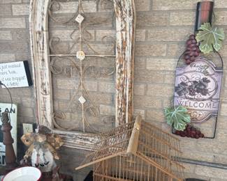 metal wall hangings, birdhouse, boot planter