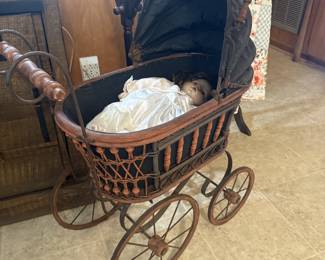 antique or victorian style doll carriage