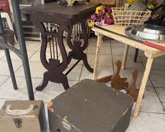 wood side table double-lyre or harp-shaped base, vinage typewriter in case, file containing 45 vinyl
