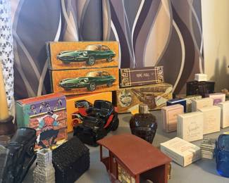 lots of collectibles and perfume bottles
