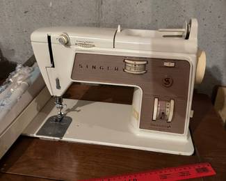 Singer sewing machine and cabinet