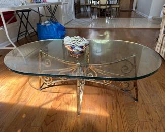 Glass coffee table with metal base......