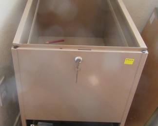 Metal filing cabinet open