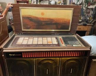 Vintage Rock-Ola Console Jukebox Model 456. Rough condition, but it works!