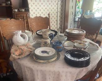 Glass dishes, red glass, ceramic pitchers, dining table with 5 chairs