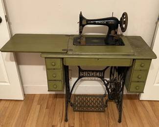 Antique Singer sewing machine and notions. 