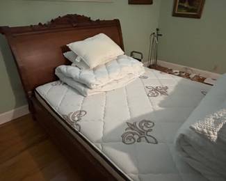 Ultra plush mattress and beautiful sleigh bed. Must see. 