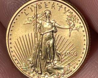 Gold five dollar USA coin