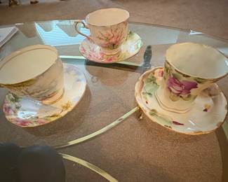 Antique teacups and saucers (many more)
